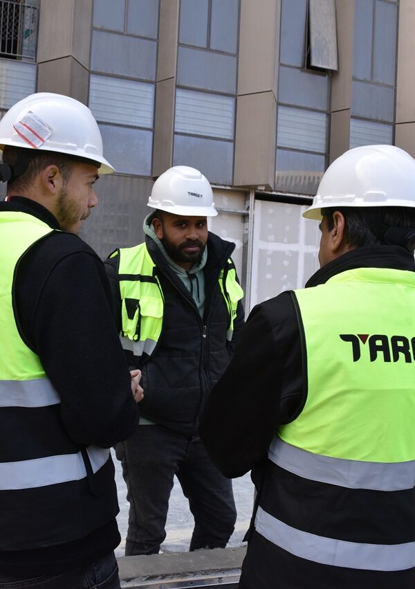 "Certified engineers conducting a site inspection at Target Engineering Specialized Works, Cairo, Egypt – discussing waterproofing solutions and project specifications."