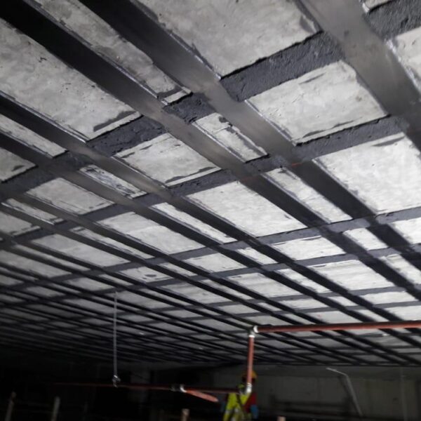 Carbon-Fiber-Sheets-Structural-Retrofitting-Target-Engineering-Egypt-Morocco.jpg "Professional Application of Carbon Fiber Sheets (CFRP) for Seismic Retrofitting | Target Engineering Egypt & Morocco"