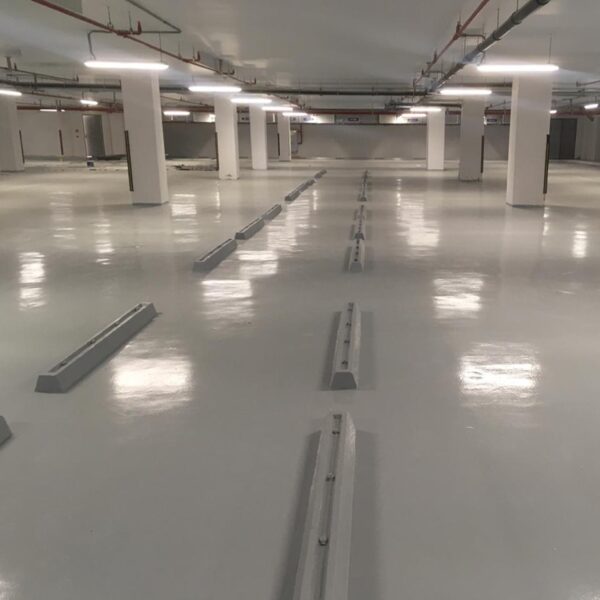 Epoxy-Coating-Systems-Industrial-Flooring-Target-Engineering-Egypt-Morocco.jpg "Professional Application of Epoxy Coating Systems on an Industrial Factory Floor | Target Engineering Egypt & Morocco"