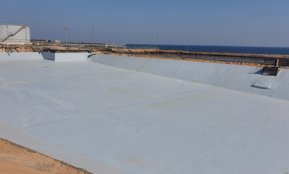Polyurea waterproofing being applied to a concrete surface by Target Engineering