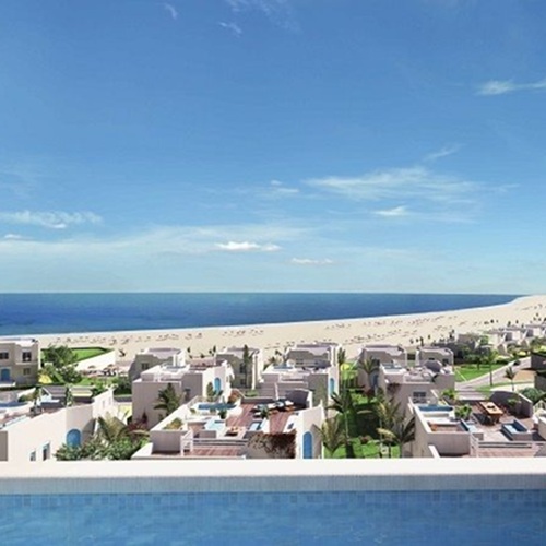 Engineers applying polyurethane foam insulation and cold-applied waterproofing membranes at Ramla Vilas