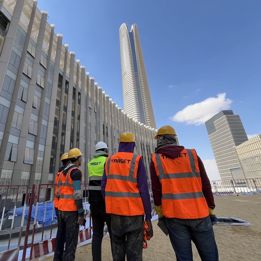 Target Engineering certified technicians applying Krypton Chemical polyurea and EPDM joint insulation at Iconic Tower, Egypt's New Administrative Capital