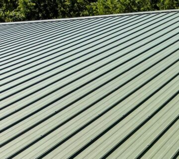 Corrugated metal roof with visible fasteners before metal roof waterproofing