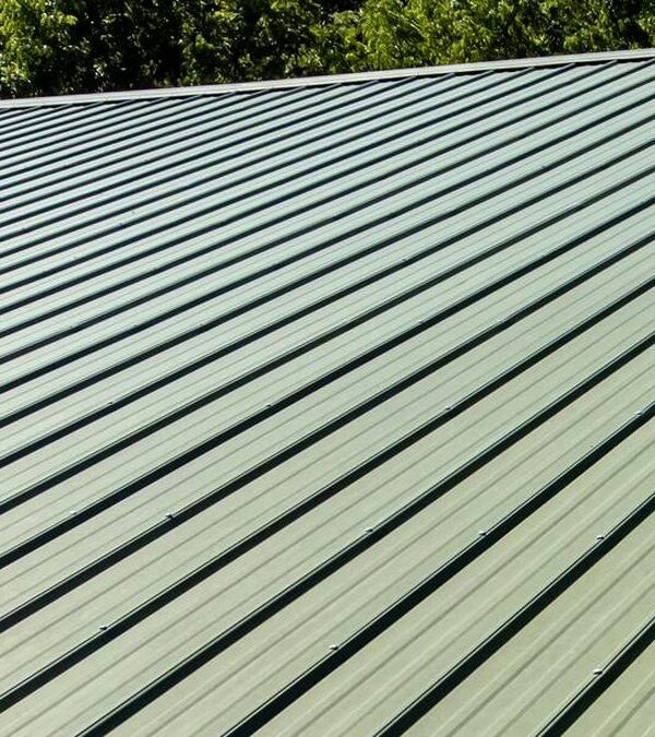Corrugated metal roof with visible fasteners before metal roof waterproofing